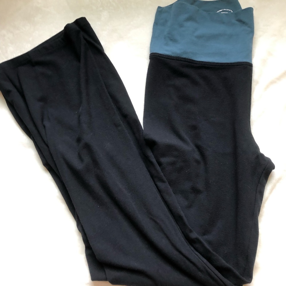 Victoria’s Secret flare yoga pants with green waste band size medium